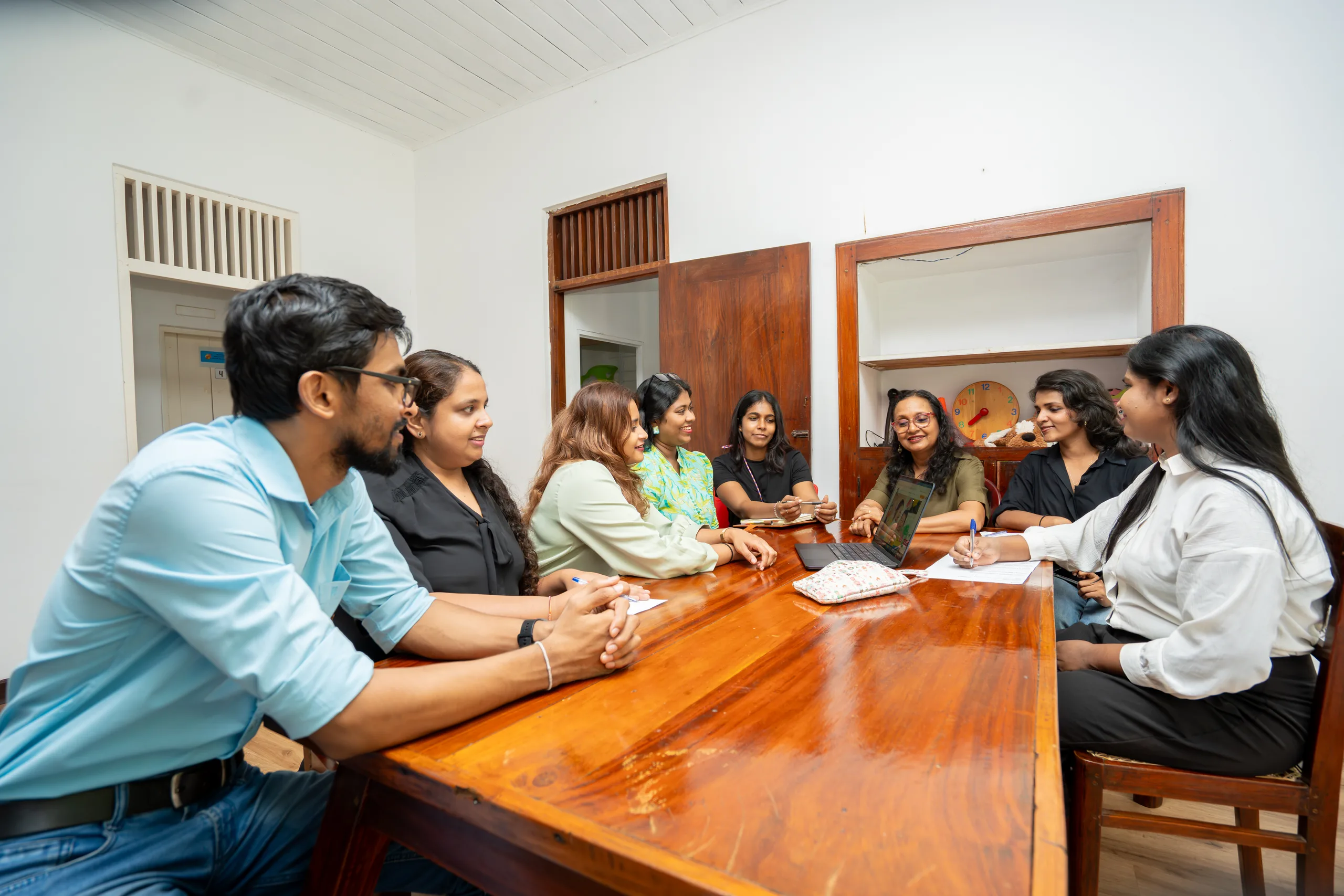 Hapana clinicians reviewing a child's therapy plan together